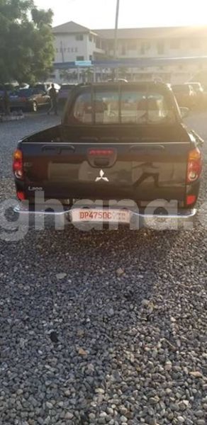 Download Buy New Mitsubishi L200 Black Car In Accra In Greater Accra Carghana PSD Mockup Templates