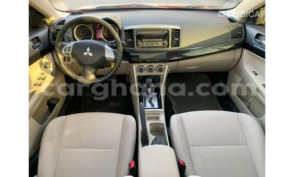 Buy Import Mitsubishi Lancer Red Car in Import - Dubai in Ashanti Buy Import Mitsubishi Lancer Red Car in Import - Dubai in Ashanti