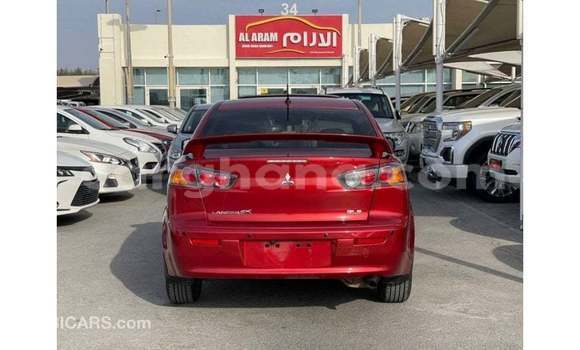 Buy Import Mitsubishi Lancer Red Car in Import - Dubai in Ashanti Buy Import Mitsubishi Lancer Red Car in Import - Dubai in Ashanti
