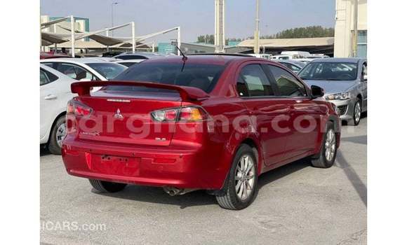 Buy Import Mitsubishi Lancer Red Car in Import - Dubai in Ashanti Buy Import Mitsubishi Lancer Red Car in Import - Dubai in Ashanti