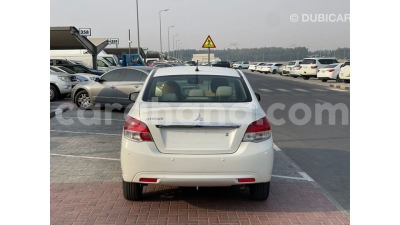 Big with watermark mitsubishi attrage ashanti import dubai 56033