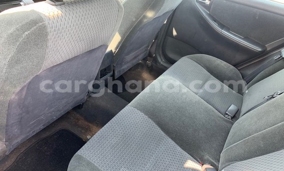 Ra Àlòkù Toyota Corolla Red Ọkọ̀ in Iwọn didun ni Oorun Ra Àlòkù Toyota Corolla Red Ọkọ̀ in Iwọn didun ni Oorun