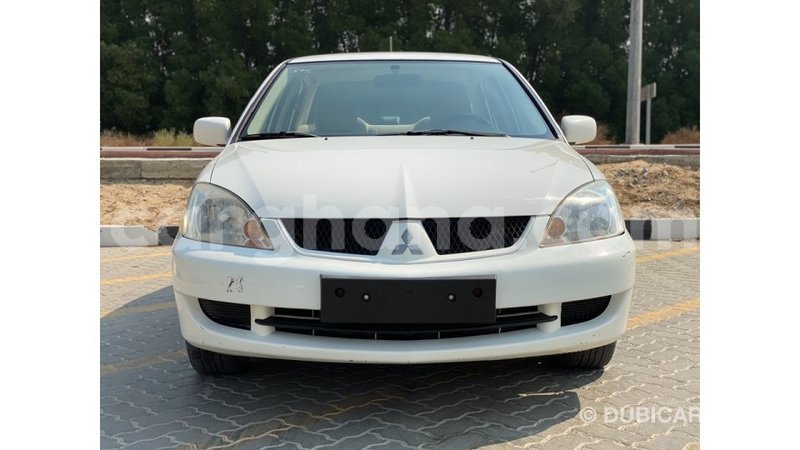 Big with watermark mitsubishi lancer ashanti import dubai 11211