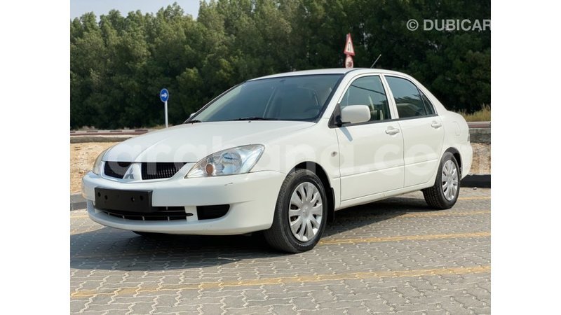 Big with watermark mitsubishi lancer ashanti import dubai 11211