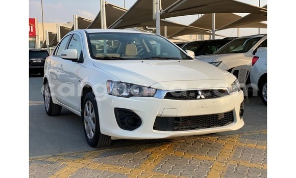 Sayi Imported Mitsubishi Lancer White Mota in Import - Dubai a Ashanti Sayi Imported Mitsubishi Lancer White Mota in Import - Dubai a Ashanti