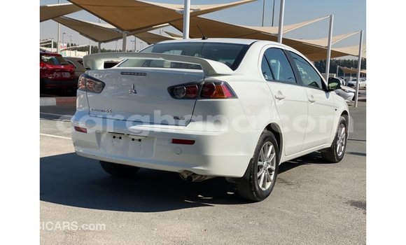 Sayi Imported Mitsubishi Lancer White Mota in Import - Dubai a Ashanti Sayi Imported Mitsubishi Lancer White Mota in Import - Dubai a Ashanti
