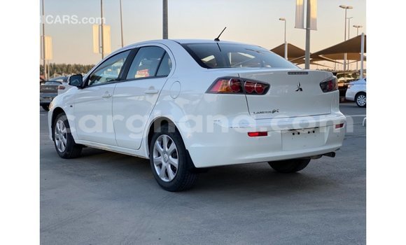 Sayi Imported Mitsubishi Lancer White Mota in Import - Dubai a Ashanti Sayi Imported Mitsubishi Lancer White Mota in Import - Dubai a Ashanti