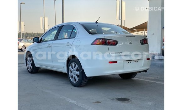 Sayi Imported Mitsubishi Lancer White Mota in Import - Dubai a Ashanti Sayi Imported Mitsubishi Lancer White Mota in Import - Dubai a Ashanti