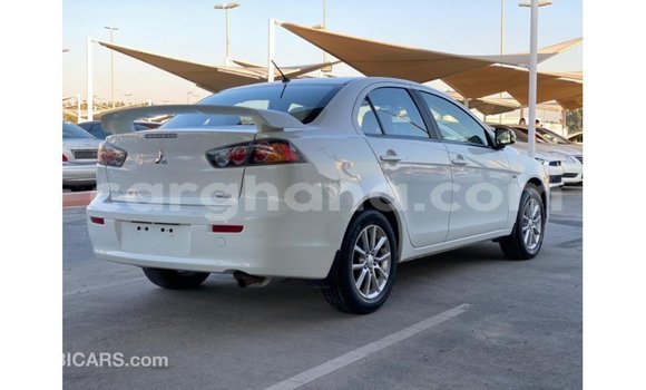 Sayi Imported Mitsubishi Lancer White Mota in Import - Dubai a Ashanti Sayi Imported Mitsubishi Lancer White Mota in Import - Dubai a Ashanti