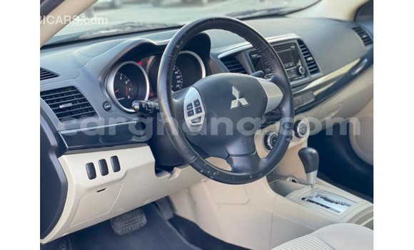 Sayi Imported Mitsubishi Lancer White Mota in Import - Dubai a Ashanti Sayi Imported Mitsubishi Lancer White Mota in Import - Dubai a Ashanti