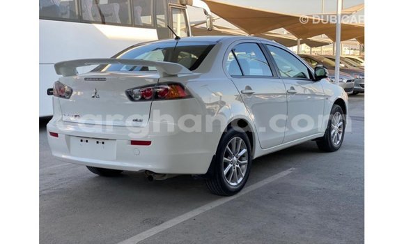 Sayi Imported Mitsubishi Lancer White Mota in Import - Dubai a Ashanti Sayi Imported Mitsubishi Lancer White Mota in Import - Dubai a Ashanti