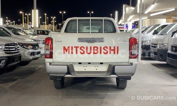 Buy Import Mitsubishi L200 White Car in Import - Dubai in Ashanti Buy Import Mitsubishi L200 White Car in Import - Dubai in Ashanti