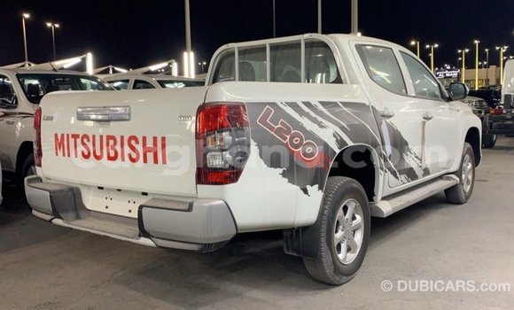 Buy Import Mitsubishi L200 White Car in Import - Dubai in Ashanti Buy Import Mitsubishi L200 White Car in Import - Dubai in Ashanti