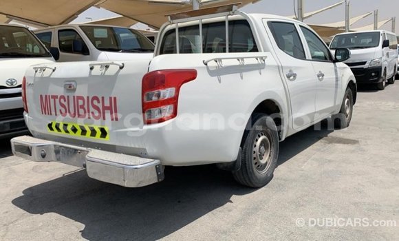 Buy Import Mitsubishi L200 White Car in Import - Dubai in Ashanti Buy Import Mitsubishi L200 White Car in Import - Dubai in Ashanti