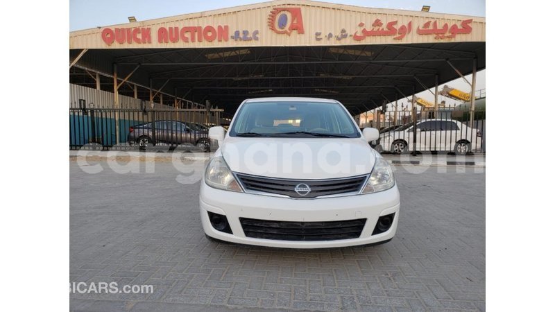 Big with watermark nissan tiida ashanti import dubai 34127