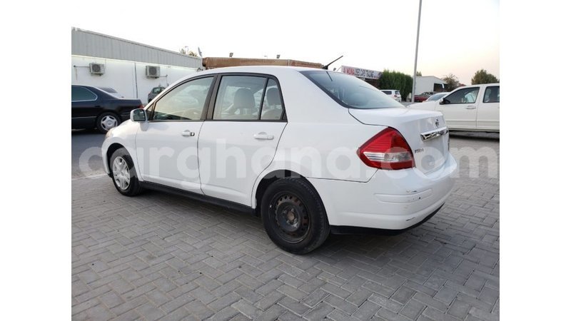 Big with watermark nissan tiida ashanti import dubai 34127