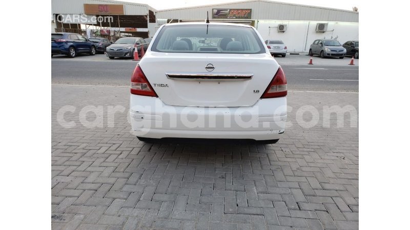 Big with watermark nissan tiida ashanti import dubai 34127