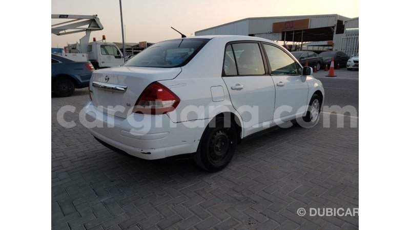 Big with watermark nissan tiida ashanti import dubai 34127