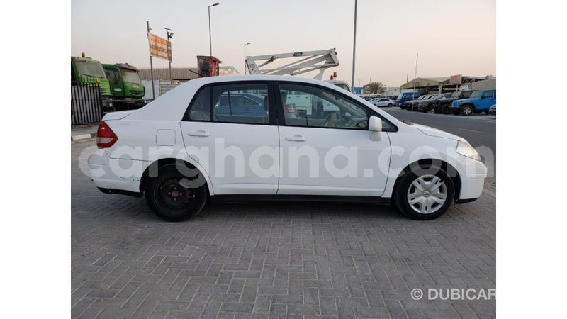 Big with watermark nissan tiida ashanti import dubai 34127