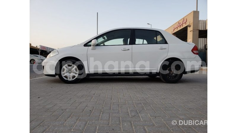 Big with watermark nissan tiida ashanti import dubai 34127