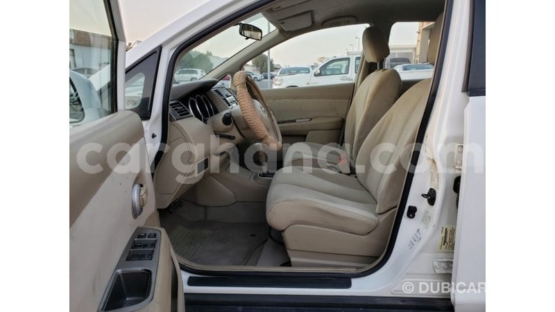 Big with watermark nissan tiida ashanti import dubai 34127