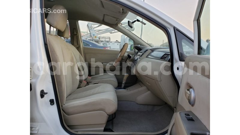 Big with watermark nissan tiida ashanti import dubai 34127