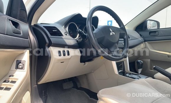 Sayi Imported Mitsubishi Lancer White Mota in Import - Dubai a Ashanti Sayi Imported Mitsubishi Lancer White Mota in Import - Dubai a Ashanti
