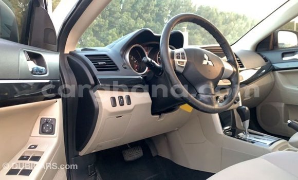 Sayi Imported Mitsubishi Lancer White Mota in Import - Dubai a Ashanti Sayi Imported Mitsubishi Lancer White Mota in Import - Dubai a Ashanti