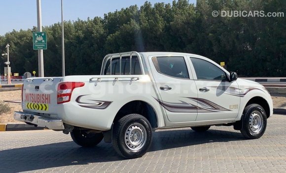 Buy Import Mitsubishi L200 White Car in Import - Dubai in Ashanti Buy Import Mitsubishi L200 White Car in Import - Dubai in Ashanti