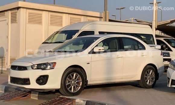Sayi Imported Mitsubishi Lancer White Mota in Import - Dubai a Ashanti Sayi Imported Mitsubishi Lancer White Mota in Import - Dubai a Ashanti
