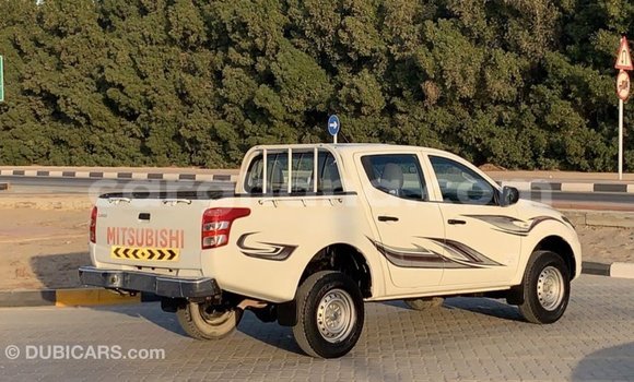 Sayi Imported Mitsubishi L200 White Mota in Import - Dubai a Ashanti Sayi Imported Mitsubishi L200 White Mota in Import - Dubai a Ashanti