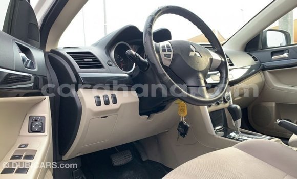 Sayi Imported Mitsubishi Lancer White Mota in Import - Dubai a Ashanti Sayi Imported Mitsubishi Lancer White Mota in Import - Dubai a Ashanti