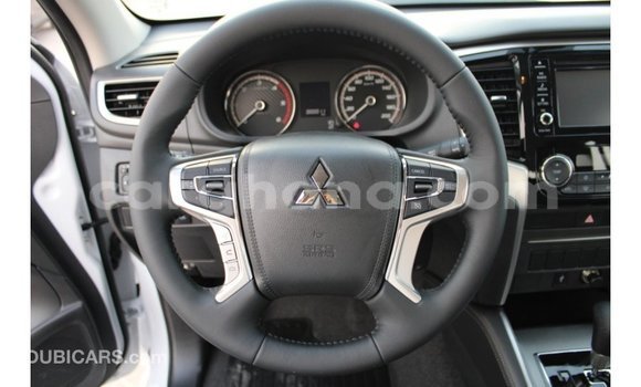 Sayi Imported Mitsubishi L200 Brown Mota in Import - Dubai a Ashanti Sayi Imported Mitsubishi L200 Brown Mota in Import - Dubai a Ashanti