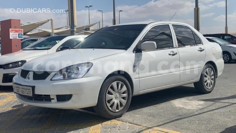 Big with watermark mitsubishi lancer ashanti import dubai 41392