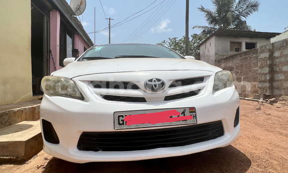 Sayi Na hannu Toyota Corolla White Mota in Tema a Greater Accra