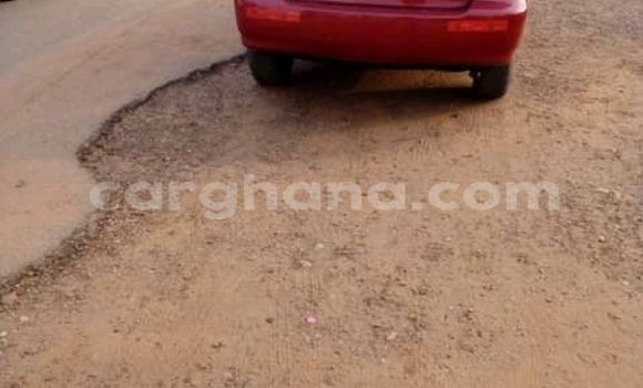Sayi Na hannu Toyota Corolla Red Mota in Accra a Greater Accra