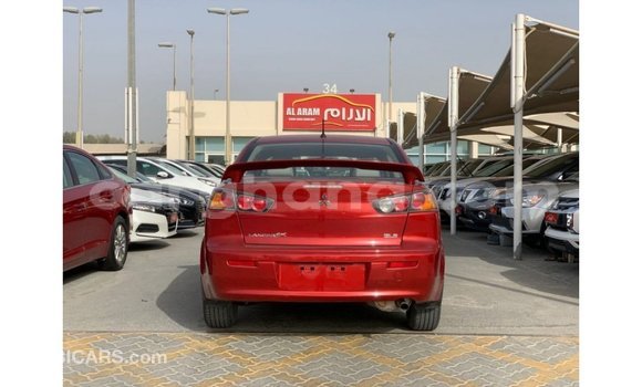 Sayi Imported Mitsubishi Lancer Red Mota in Import - Dubai a Ashanti Sayi Imported Mitsubishi Lancer Red Mota in Import - Dubai a Ashanti
