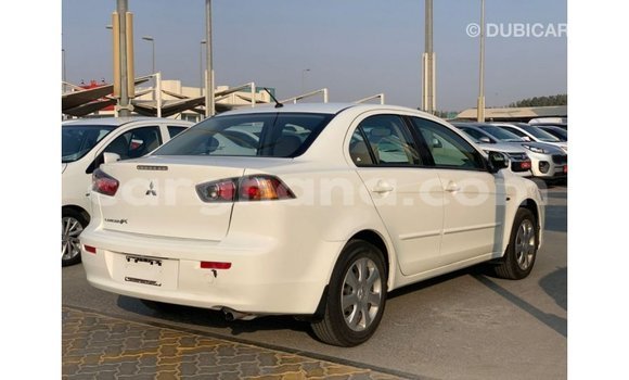 Sayi Imported Mitsubishi Lancer White Mota in Import - Dubai a Ashanti Sayi Imported Mitsubishi Lancer White Mota in Import - Dubai a Ashanti