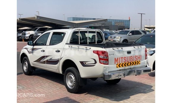 Buy Import Mitsubishi L200 White Car in Import - Dubai in Ashanti Buy Import Mitsubishi L200 White Car in Import - Dubai in Ashanti
