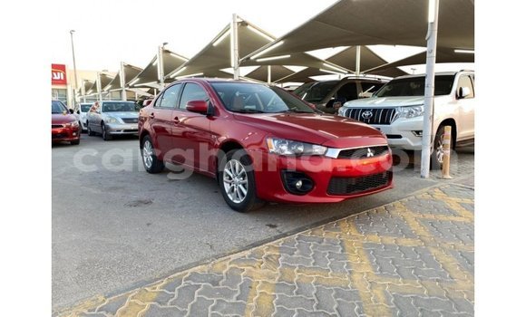 Buy Import Mitsubishi Lancer Red Car in Import - Dubai in Ashanti Buy Import Mitsubishi Lancer Red Car in Import - Dubai in Ashanti