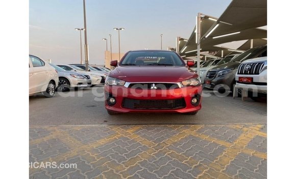 Buy Import Mitsubishi Lancer Red Car in Import - Dubai in Ashanti Buy Import Mitsubishi Lancer Red Car in Import - Dubai in Ashanti