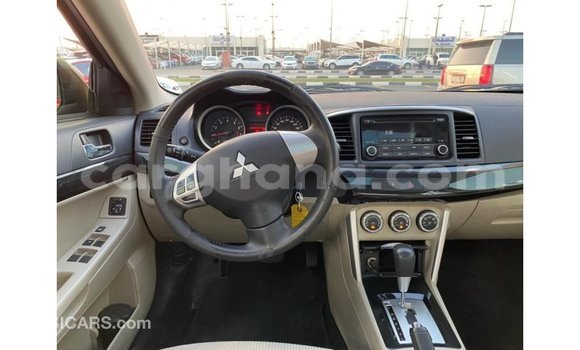Buy Import Mitsubishi Lancer Red Car in Import - Dubai in Ashanti Buy Import Mitsubishi Lancer Red Car in Import - Dubai in Ashanti