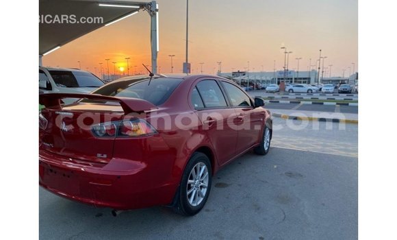 Buy Import Mitsubishi Lancer Red Car in Import - Dubai in Ashanti Buy Import Mitsubishi Lancer Red Car in Import - Dubai in Ashanti
