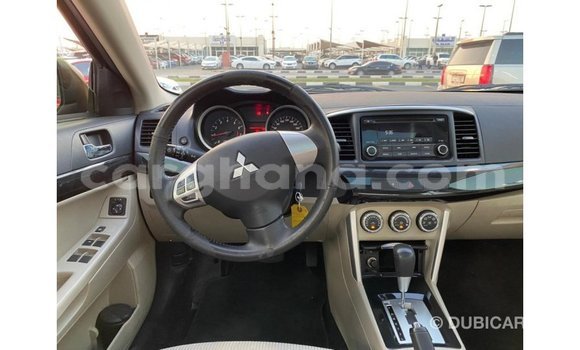 Buy Import Mitsubishi Lancer Red Car in Import - Dubai in Ashanti Buy Import Mitsubishi Lancer Red Car in Import - Dubai in Ashanti