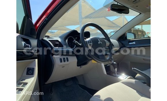 Buy Import Mitsubishi Lancer Red Car in Import - Dubai in Ashanti Buy Import Mitsubishi Lancer Red Car in Import - Dubai in Ashanti