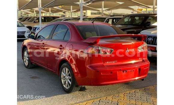 Buy Import Mitsubishi Lancer Red Car in Import - Dubai in Ashanti Buy Import Mitsubishi Lancer Red Car in Import - Dubai in Ashanti