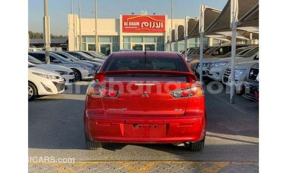 Buy Import Mitsubishi Lancer Red Car in Import - Dubai in Ashanti Buy Import Mitsubishi Lancer Red Car in Import - Dubai in Ashanti